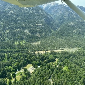 Aerial view of a mountain valley airstrip